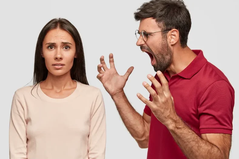 A husband yelling at his wife
